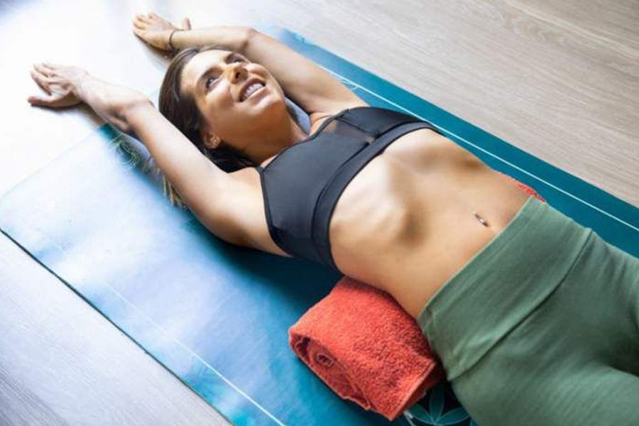 Burn Your Middle-Aged Midsection With 5 Hot Yoga Exercises
