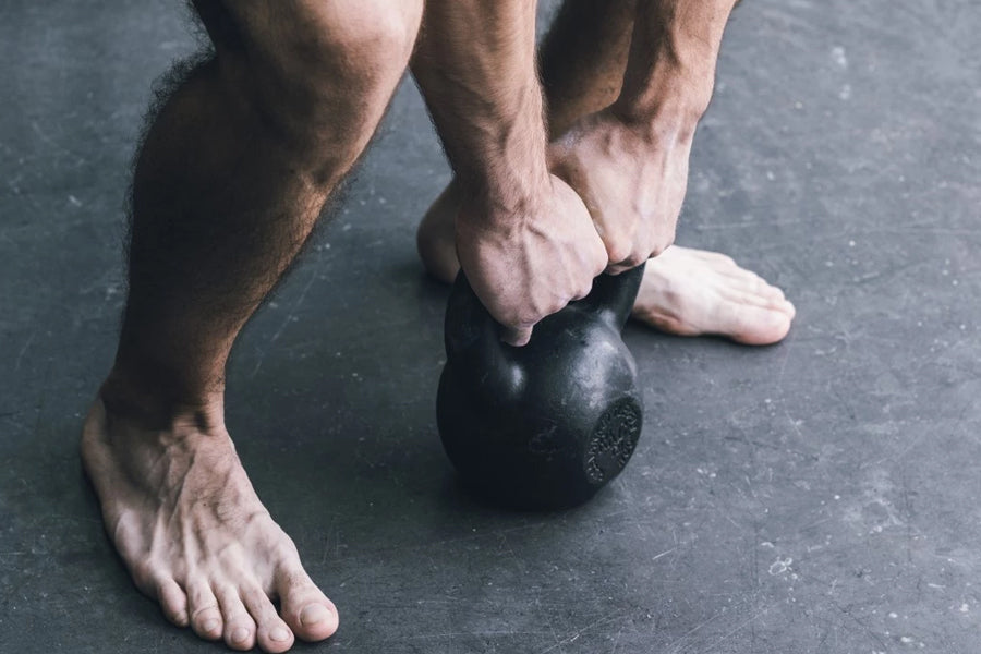 Is It Safe to Workout Barefoot? We Asked Trainers
